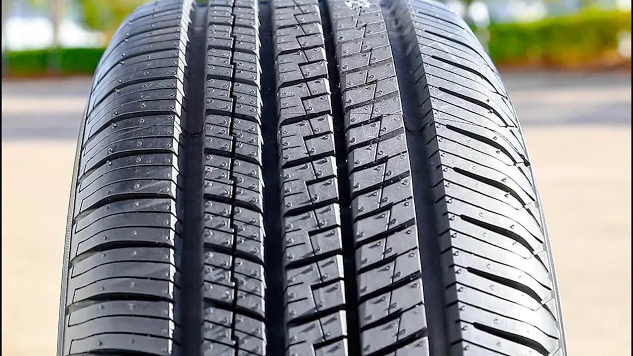 High-clarity close-up of all-season tire tread pattern