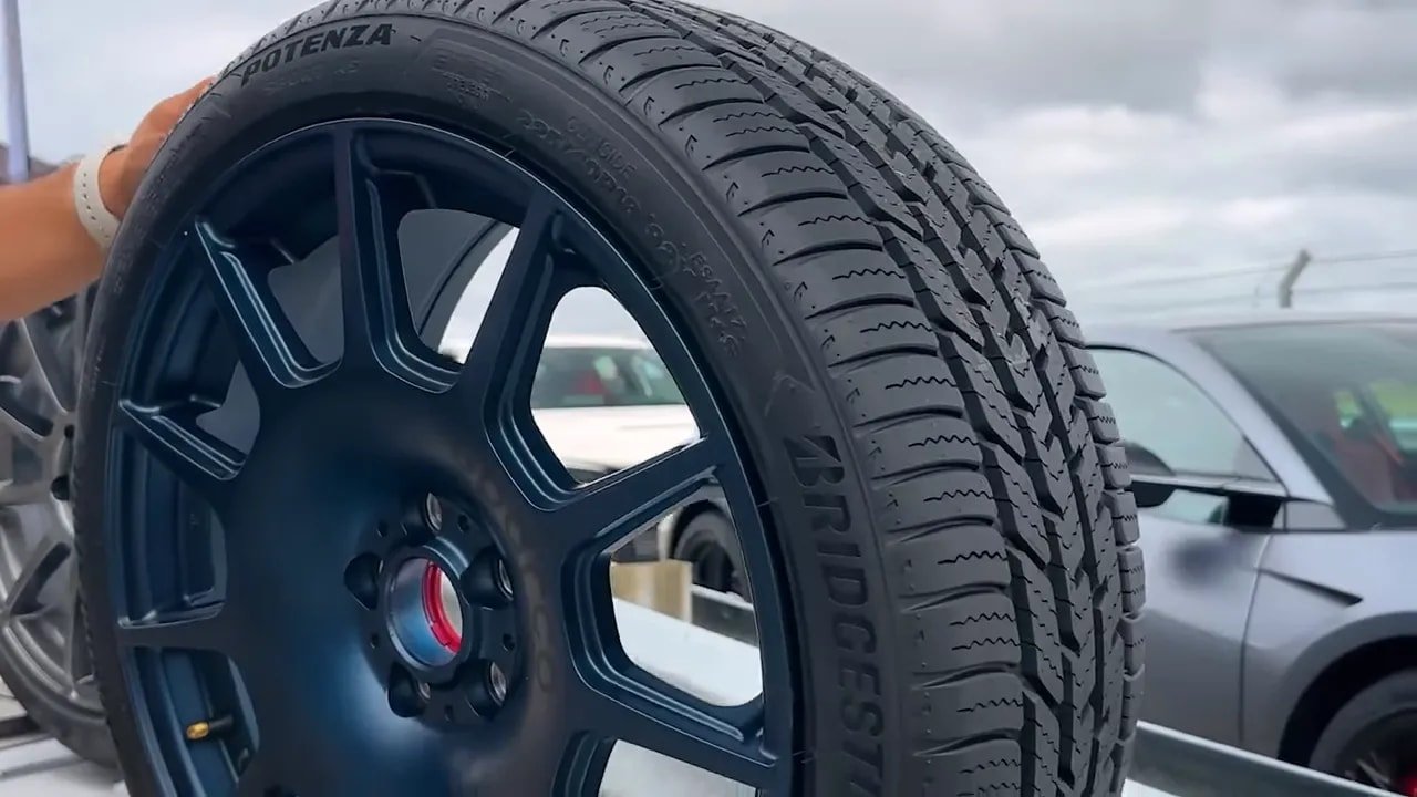 Close-up of Bridgestone Potenza Sport A/S tire tread pattern