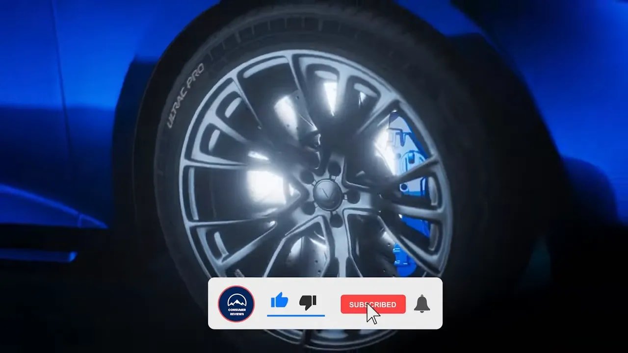Clear close-up of a summer tire on a wheel with visible sidewall lettering