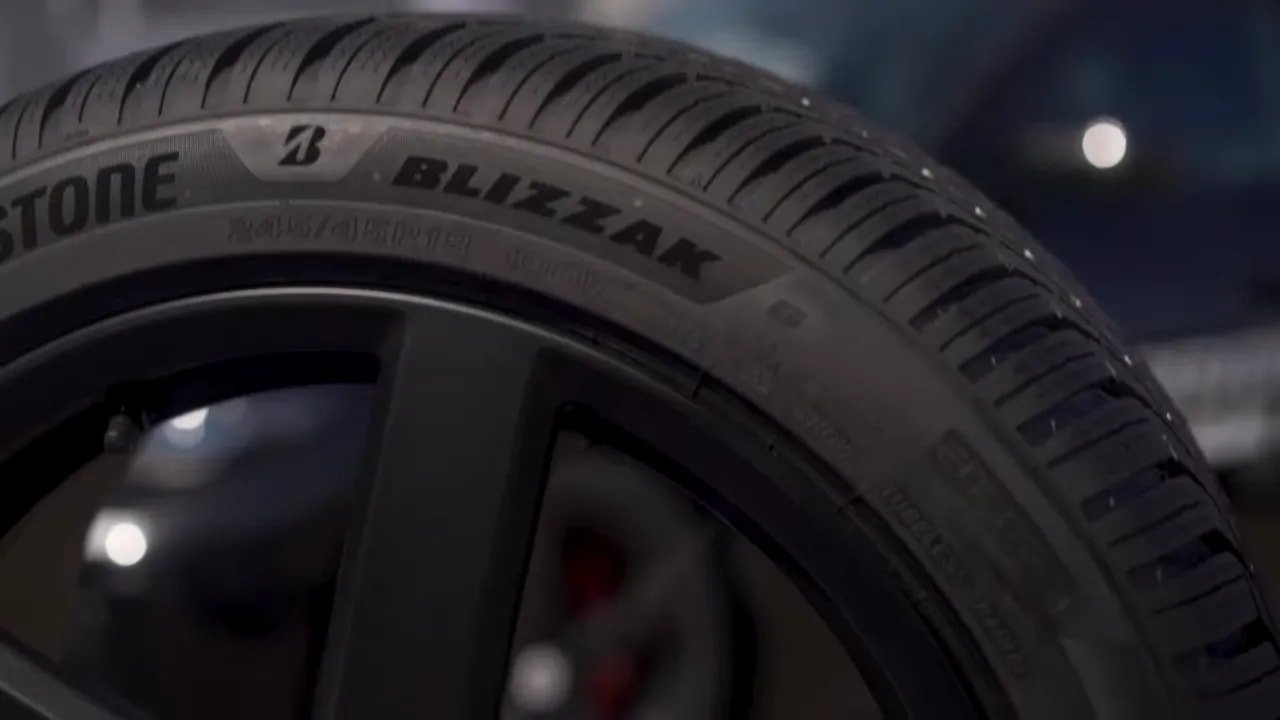 Close-up of all-season tire tread pattern