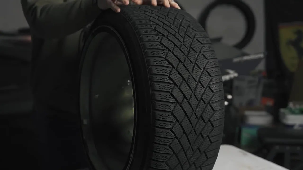 Close-up of winter tire tread pattern for snow and slush control