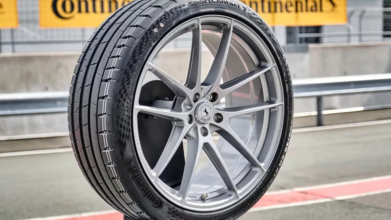Continental SportContact 7 UHP summer tire close-up on alloy wheel outdoors