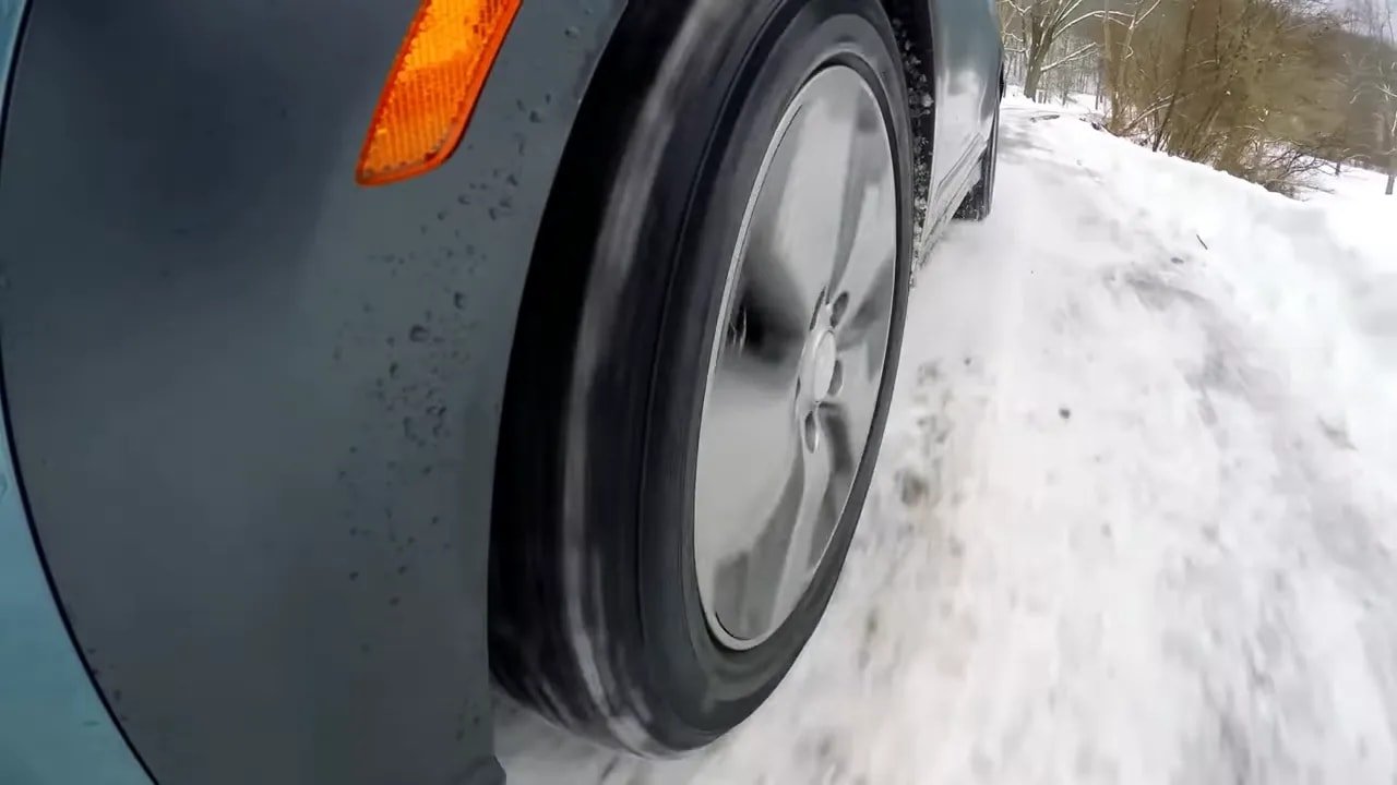 EV wheel and winter tire on snow