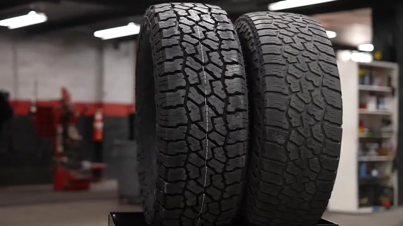 Front view of Falken WildPeak A/T3W tire showing aggressive tread blocks for wet traction