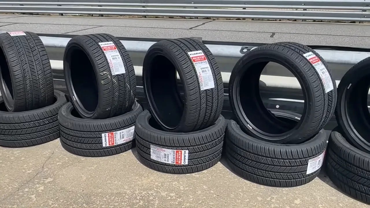 Kumho Ecsta Sport S summer tires laid out with sidewall markings visible