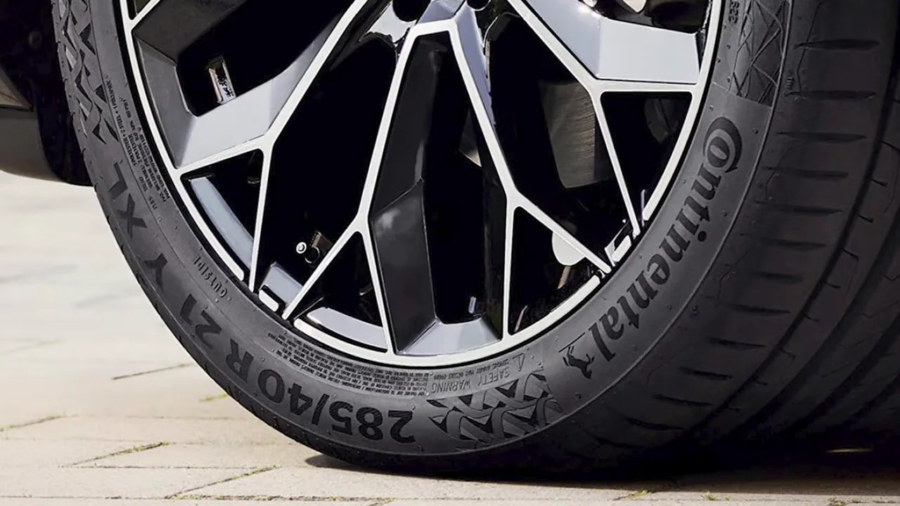 Low-angle close-up of a Bridgestone Potenza Sport tire and wheel