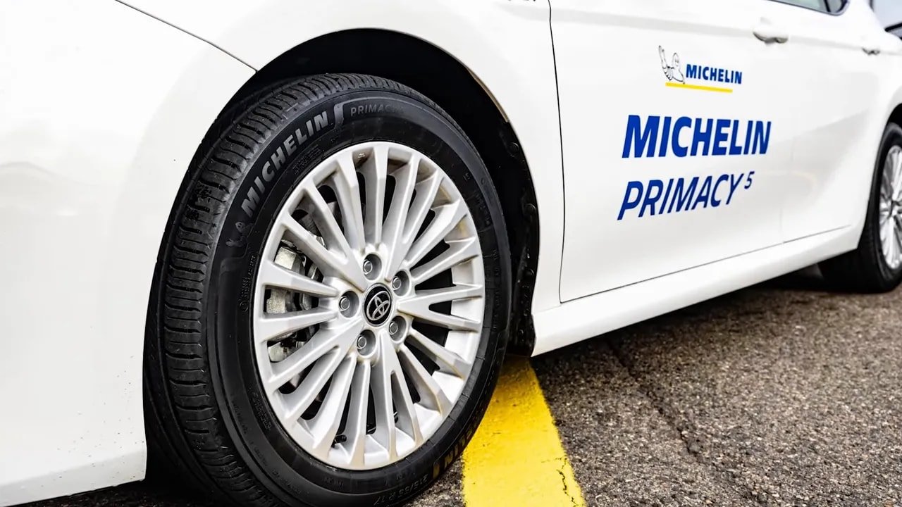 Michelin Primacy 5 tire close-up showing brand and model text