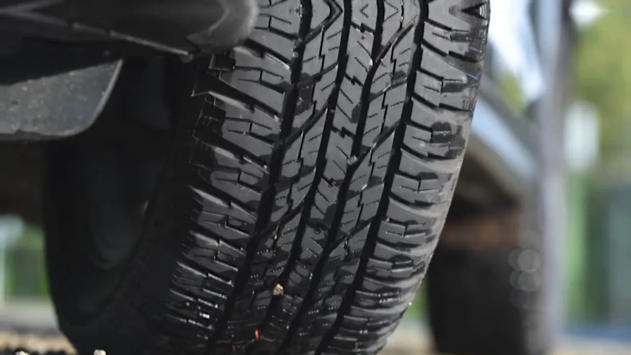 Close-up of an all-terrain tire tread pattern for reduced highway road noise